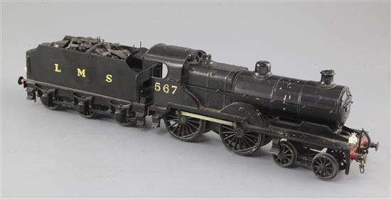 A scratch built O gauge 4-4-0 tender locomotive, compound number 567, LMS black livery, 3 rail, overall 39cm